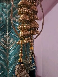 Beautiful Teal Lehenga with Intricate Embroidery