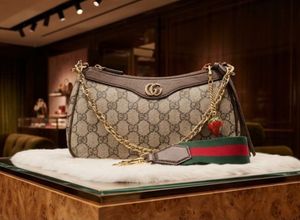 Gucci Monogram Shoulder Bag with Strawberry Charm