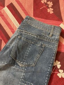 Patchwork Distressed Denim Jeans