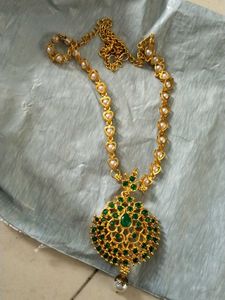 Stunning Gold Necklace with Green Stones