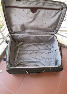 Brown Soft Shell Suitcase With Gold Accent