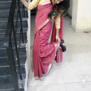 Elegant Pink Saree with Gold Border