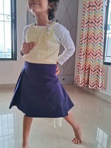 Plated Wrapped Mini Skirt.