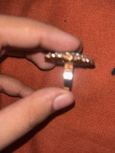 stylish indian earing with a pearl choker and ring
