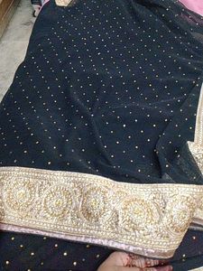 Elegant Black Blouse with Embellished Neckline