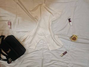 Elegant Cream Top with Cross Back Detail