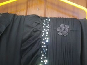 Elegant Black Saree with Embellishments f