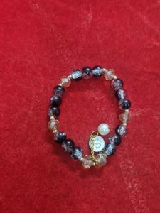Elegant Beaded Bracelet with Charm