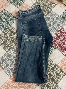 Distressed Blue Denim Jeans