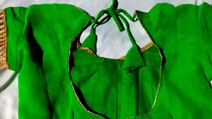 PRINCESS CUT DESVibrant Green Blouse with Gold TRI