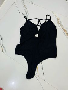 Black Ribbed Criss-Cross Bodysuit