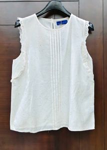 Elegant Sleeveless Cream Top
