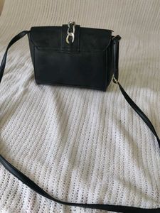 Chic Black Crossbody Bag with Chain Detail