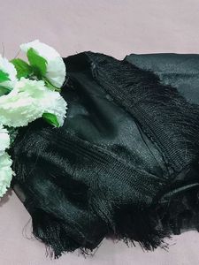 ethentic black three piece suit .