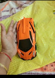 Vibrant Orange Coloured Car Toy Battery Operated
