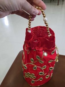 Red Potli Bag with Gold Embellishments
