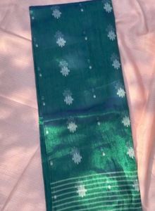 Viral Emerald Green Tissue Silk Saree