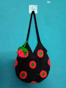 Crocheted Black Handbag with Floral Design