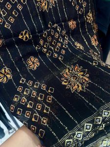 Rolling Black Saree with Gold Print
