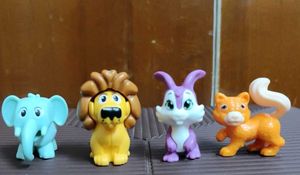 Set of 4 kinder Joy cute animal figurines
