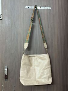 Stylish Beige Hobo Bag with Boho Strap