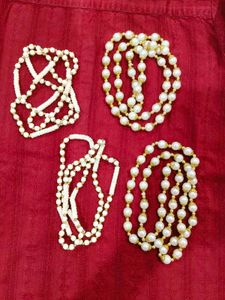 4 Pearl Necklaces with velvet pouch