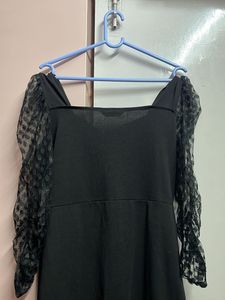 Chic Black Dress with Lace Sleeves