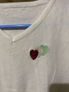 Cute White V-Neck Top with Heart Detail