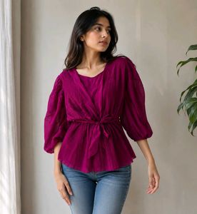A beautiful decent purple top with florry sleeves