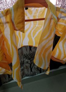 yellow dress with over coat