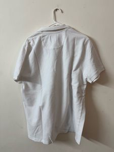 Classic White Polo Shirt with Embroidered Detail