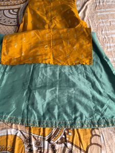Elegant Yellow Kurta with Teal Skirt Set