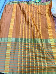 Vibrant Orange Saree with Golden Stripes