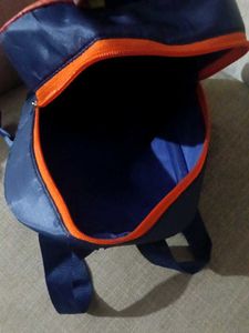 Compact Blue &amp; Orange Drawstring Bag