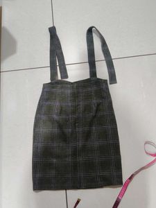 checked skirt with belt