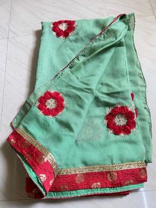 Elegant Mint Green Embroidered Saree
