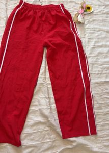 Red Track Pants with White Stripes