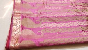 Elegant Pink Saree with Gold Paisley