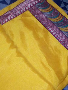 Vibrant Yellow Saree with Ornate Border