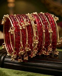 Elegant Red Bangles with Gold Accents