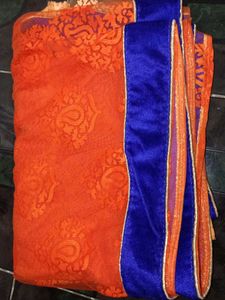 Vibrant Orange Saree with Royal Blue Border