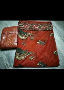 Elegant Embroidered Orange Saree
