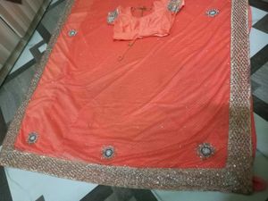 Elegant Peach Saree with Embellishments