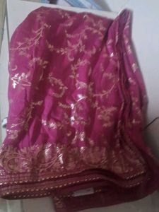Elegant Pink Saree with Gold Motifs