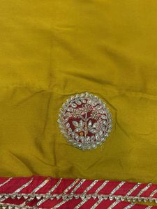 Yellow Saree with Red Embroidered Blouse