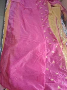 Elegant Pink Saree with Golden Motifs