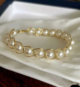 Elegant Pearl & Gold Tone Bracelet