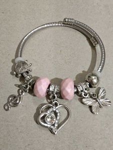 Charming Silver Charm Bracelet with Pink Beads