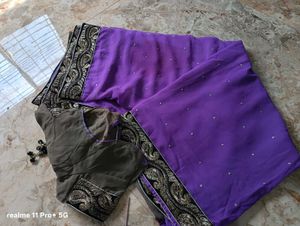 Elegant Purple Saree with Intricate Border