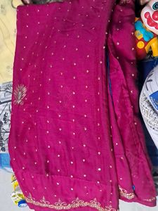 Beautiful Pink Saree with Golden Embellishments